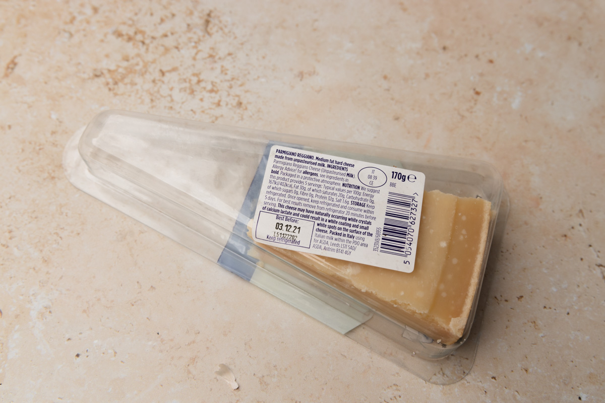 the back of cheese packaging showing label instructions.