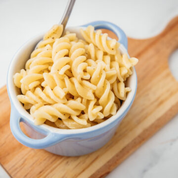 cooked pasta in a small bowl.