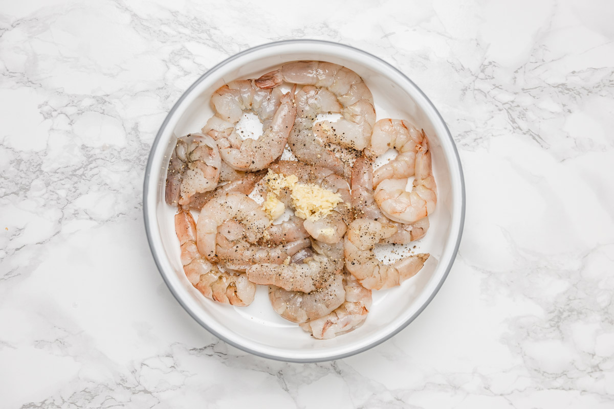 raw shrimp in a baking dish.