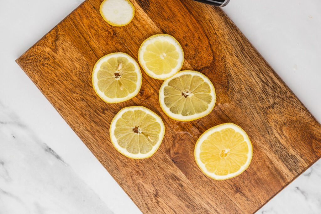 lemon slices on a chopping board